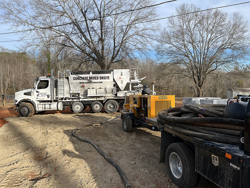 Rock Creek Concrete Company pumping concrete from a delivery truck