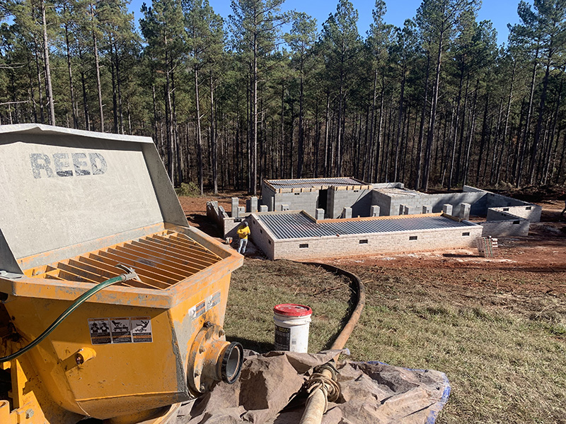 Rock Creek Concrete Pumping using a line pump to deliver concrete to a difficult to access area