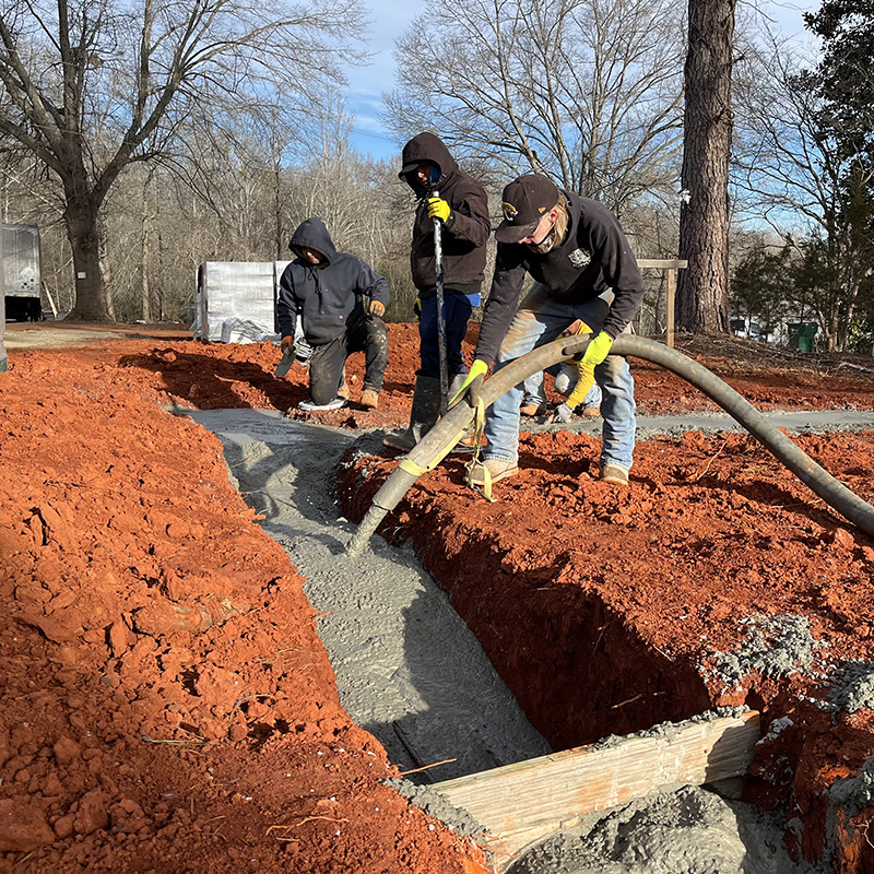 Rock Creek Concrete Pumping onsite delivering concrete