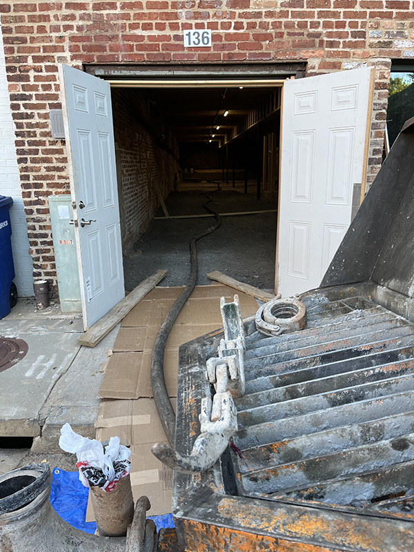 Rock Creek Concrete Pumping assisting in this basement remodel