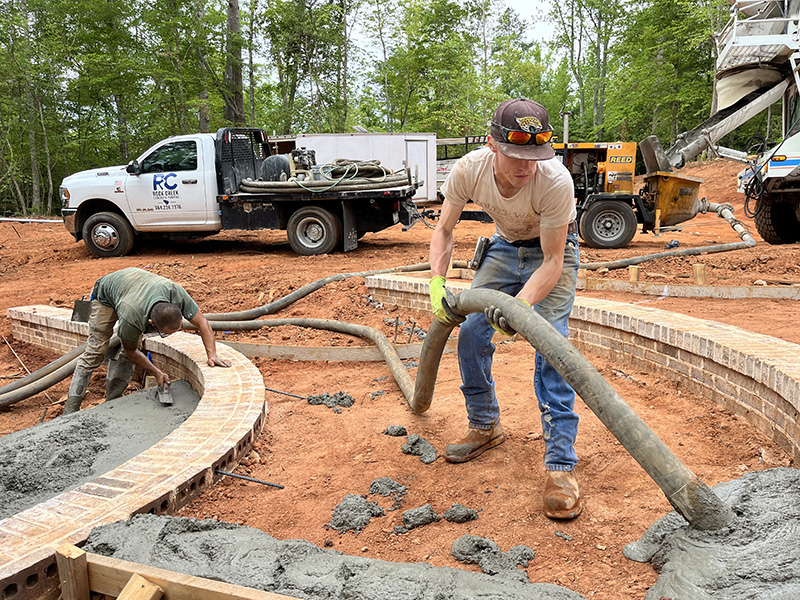 Rock Creek Concrete Pumping employee working on a residential project